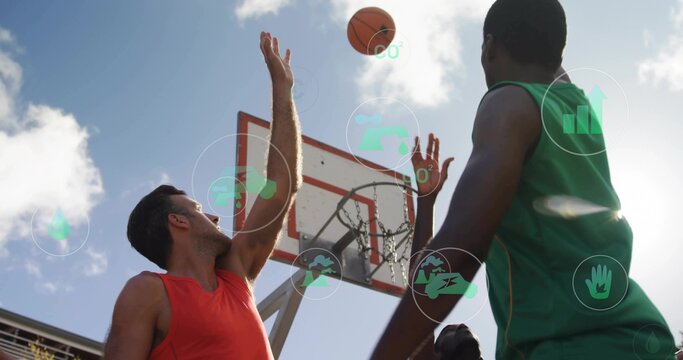 Reaching male players in sleeveless tops contesting shot at park, with basketball, HUD icons