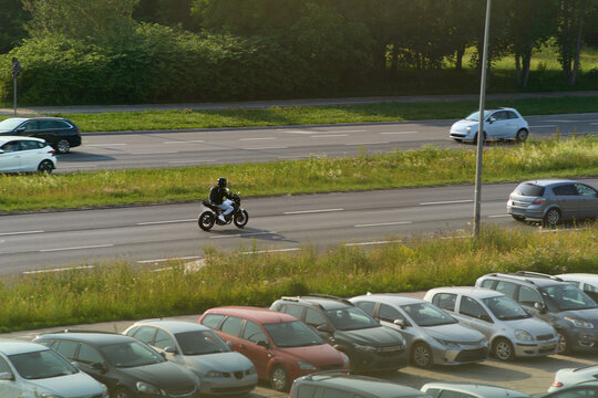 Rider traveling along quiet countryside road