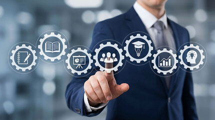 Obraz premium Businessman touching digital screen with business growth and learning icons