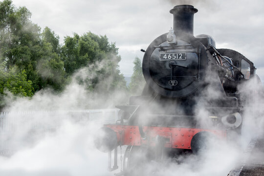 steam train on a fire