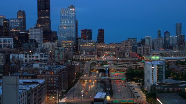 Smart city technology with data visualization tracking vehicles on Chicago highway interchange showing futuristic artificial intelligence network collecting information
