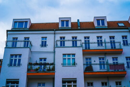 Modern apartment building with balconies and windows