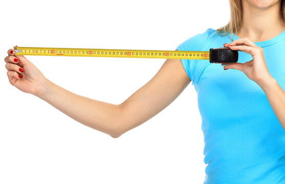 Woman shows a yellow measure tape, isolated