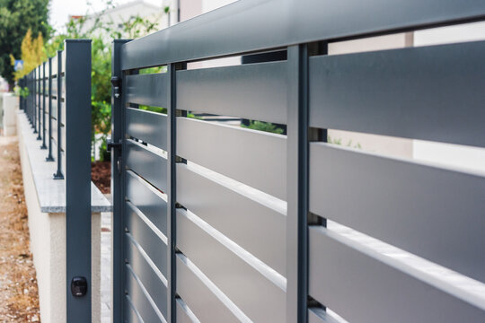 Modern fence with aluminum or metal shutter
