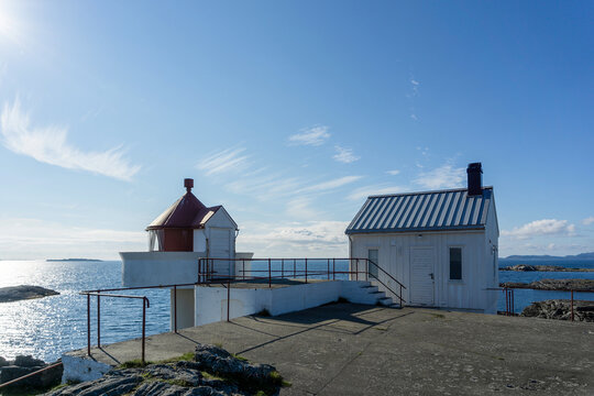 Fj&oslash;l&oslash;y Lighthouse on Moster&oslash;y coast with blue sky