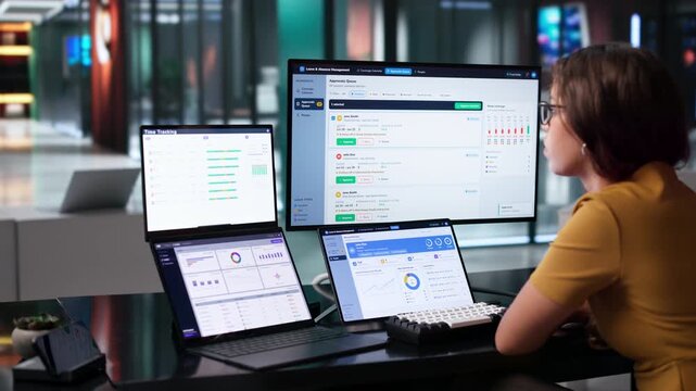 HR Manager Reviews Employee Time Off Requests On Laptop
