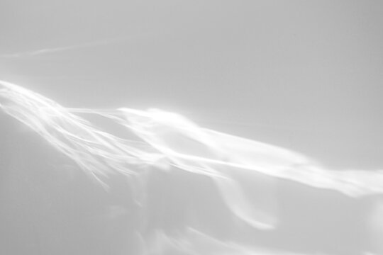 Real flowing water caustic shadow cut out on a transparent png background with soft diffused edges. Pairs with an airy wellness mockup overlay, a high-energy motion and speed aesthetic as.