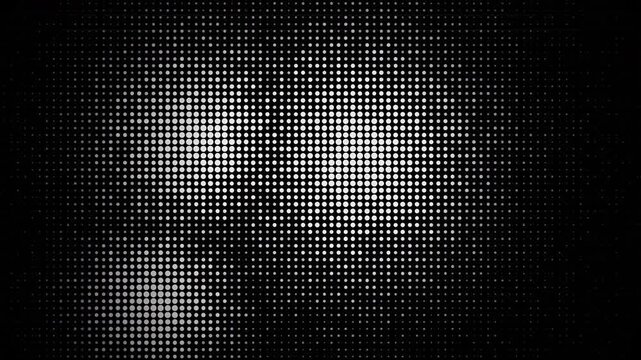 Dynamic abstract white halftone dots pattern creating a digital screen effect with flowing light particles, ideal for technology presentations, modern backdrops and futuristic concept videos
