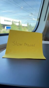 Slow Travel Note on Train Table Vertical Video
