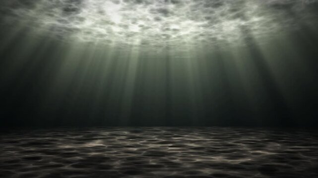 Mysterious dark deep sea underwater background with faint moonlight rays shining through murky water illuminating the black ocean floor for marine vibe