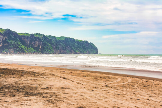 Landscape Parangtritis Tropical beach with clouds and blue sky 