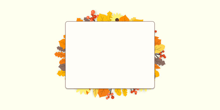 Autumn season background with blank white card surrounded by falling leaves and yellow sunflower for seasonal banner or invitation