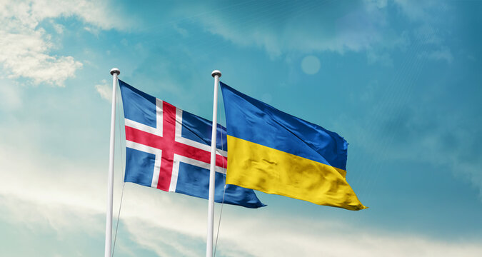 Iceland Ukraine friendship flags are waving in the sky. Two country flag for agreement or deal. Iceland Ukraine national flag for commitment.