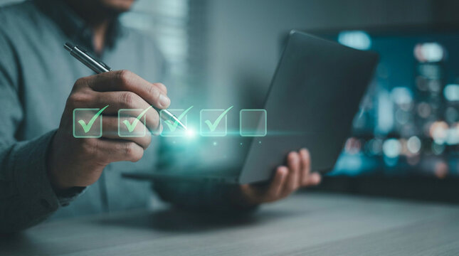 Professional checking off tasks on digital holographic interface.