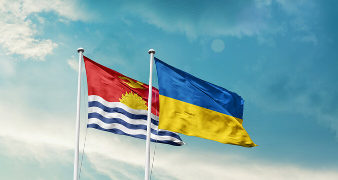 Kiribati Ukraine friendship flags are waving in the sky. Two country flag for agreement or deal. Kiribati Ukraine national flag for commitment.