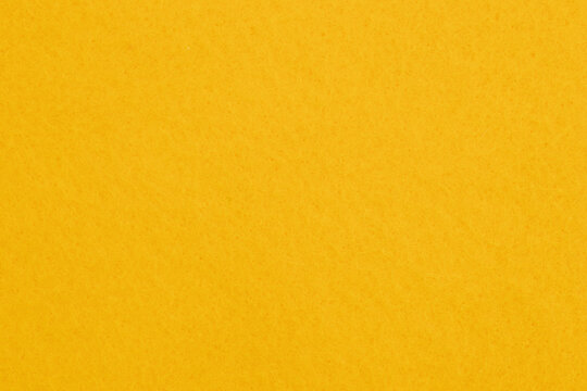 Bright yellow felt fabric background