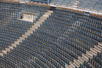 Fototapeta premium Audience seats - empty concert venue in France. Grey plastic chairs.