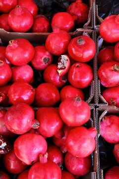 Pomegranate fruit at local farmer's market in Orange town, Provence region of France.