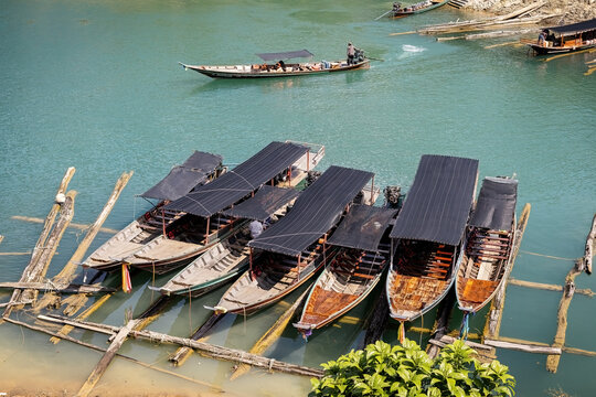 Aerial view of the long tail boats on the water in Khao Sok National Park in Thailand