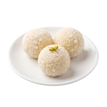  Bengali Kheer Kadam sweets with textured sugar coating, isolated on clean.