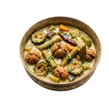Bengali Shukto (bitter mixed vegetable stew) with Bori in a traditional brass bowl, pure