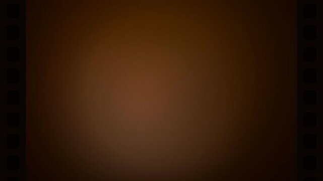 Warm brown gradient background with film grain and subtle light leak, abstract background concept for vintage film, retro media and nostalgia projects