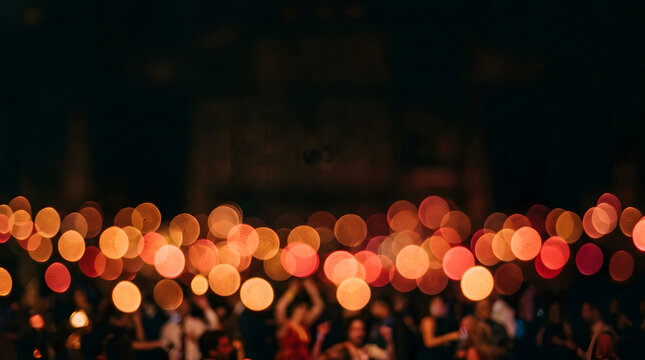 Out of focus crowd at concert with warm bokeh lights | Abstract nighttime city life background with glowing circles | Blurred party audience at music festival | Warm festive celebration background