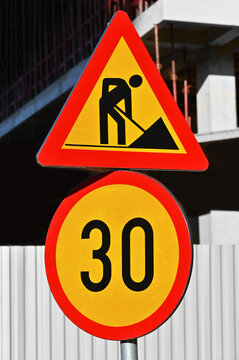 Temporary road work sign with speed limit