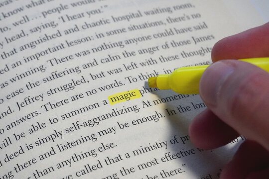 Magic word highlighted in a book page.