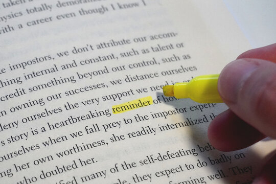Reminder word highlighted in a book page.