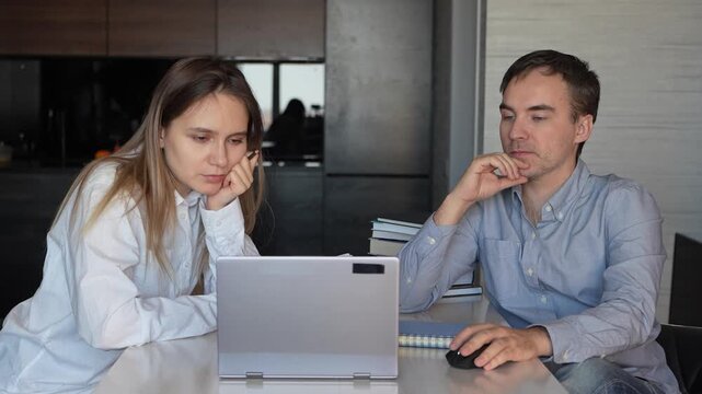 Coworking, couple in office and working together for planning remote work startup strategy online. Small business, man and woman at desk on laptop, networking email and web research at digital agency