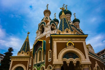Orthodox church domes against a cloudy sky © Novanture
