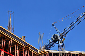 Blue tower crane and construction equipment © Unkas Photo