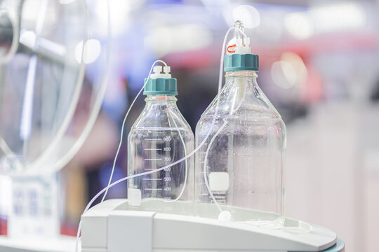 Modern laboratory table with glass flasks bottles Automatic titrator in biochemical laboratory.