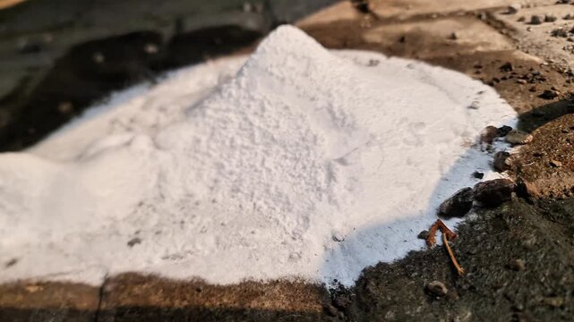 Industrial Spill of Solid Carbon Dioxide Dry Ice Melting on Paving Blocks from Drainage Leak