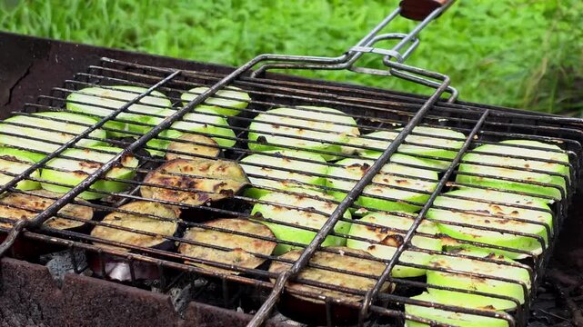 Grilling vegetables outdoors on a summer day with friends