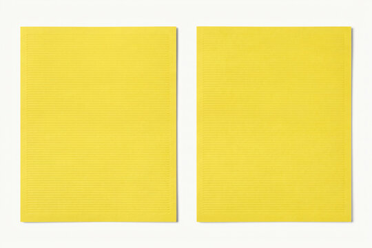 Two blank rectangular yellow cards standing side by side with yellow background