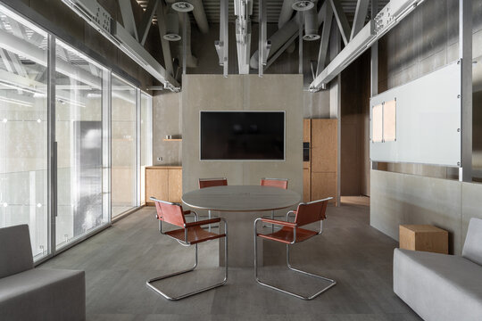 Modern meeting room in industrial office interior