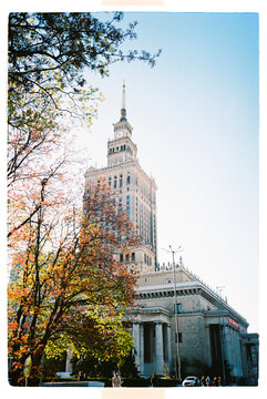 Palace of Culture and Science in Warsaw framed by autumn trees