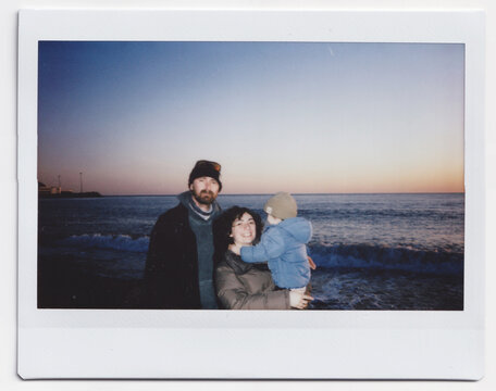 Family Portrait By The Sea At Sunset