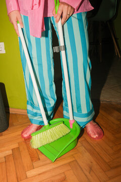 Sweeping Wooden Floor at Home