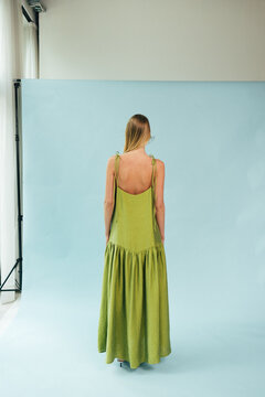 Full Length Studio Portrait of Blonde Model in Apple Green Maxi Dress