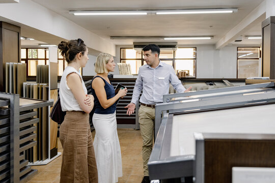 Supplier explaining materials to architect and client