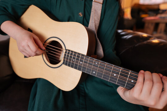 Playing Acoustic Guitar Indoors