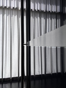 Curtains And Window Reflection