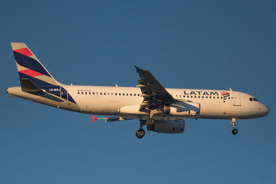 side view of an Airbus A320 used by LATAM Airlines about to land at Cordoba airport, Argentina, during sunrise, July 21, 2018.