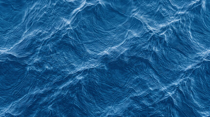 Obraz premium High angle view of rhythmic blue ocean waves under even ambient lighting