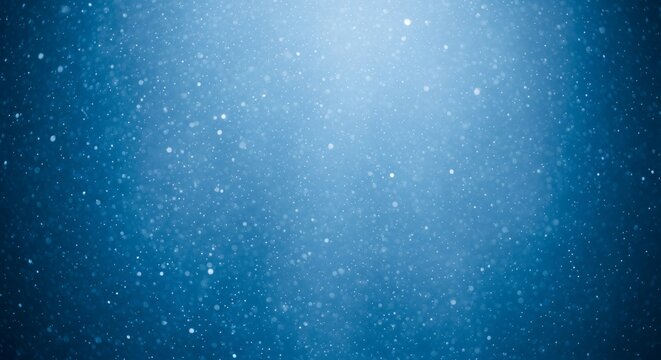 Abstract blue background with subtle light and floating particles, creating a serene and ethereal atmosphere.