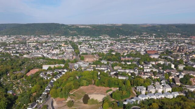 Trier cityscape, ancient roman city with imperial bath, Constantine Basilica, Amphitheater and Cathedral, aerial view over Moselle river valley, rhineland palatinate, Germany