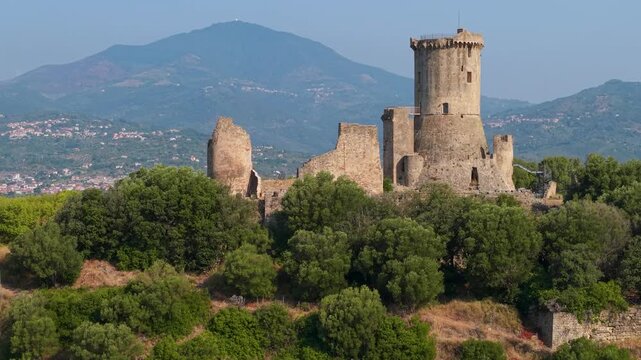 Torre di Velia Ascea Cilento Italy 70mm drone flyover ancient tower archaeological site amphitheater in morning light sea coast panorama. travel destination 4k video